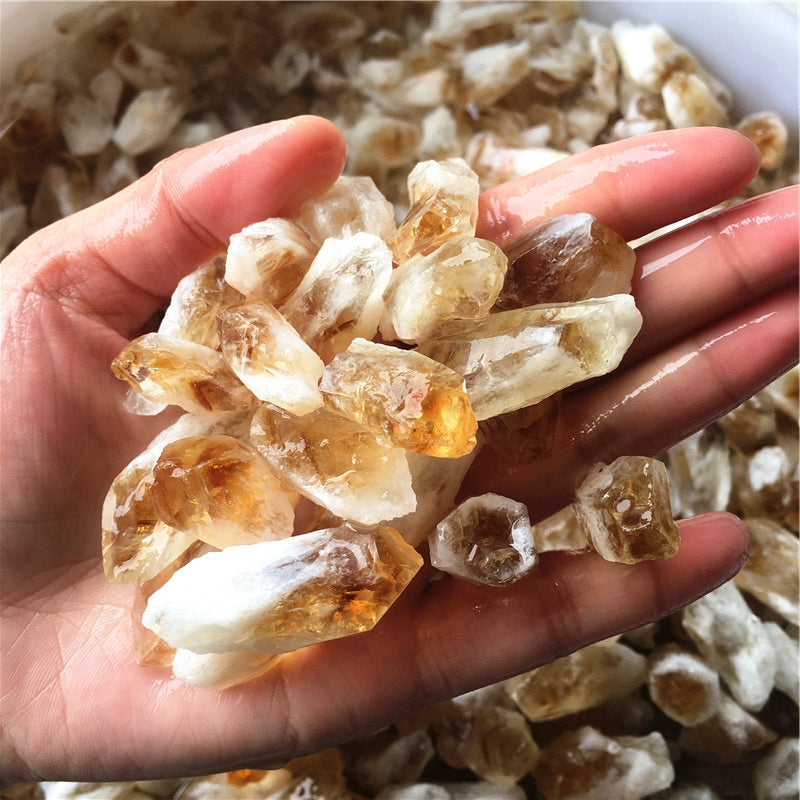 Citrine rough crystal point close up golden yellow color natural