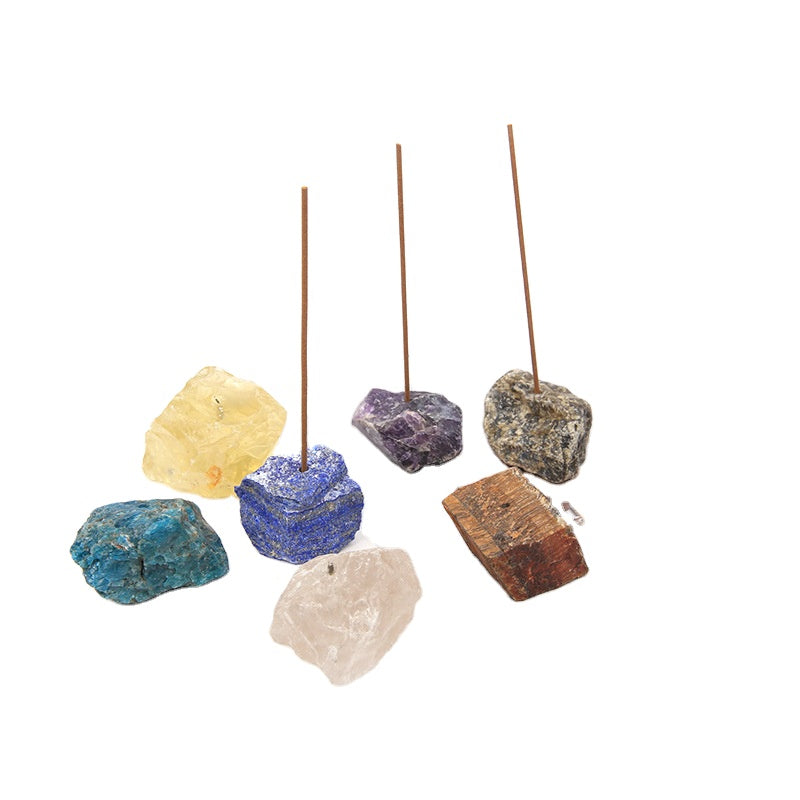 Crystal incense holder with incense stick burning sacred smoke