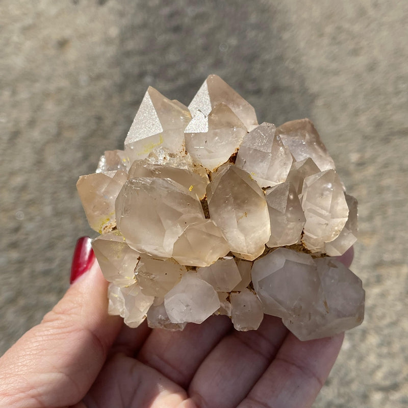 White quartz cluster raw stone close up crystal points formation